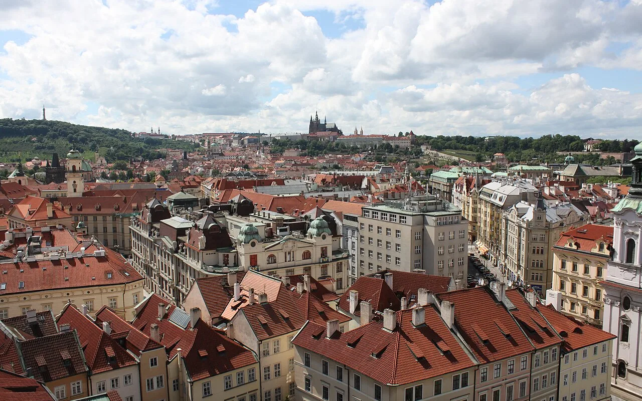 Prague Castle and the Hradčany skyline seen from a clocktower